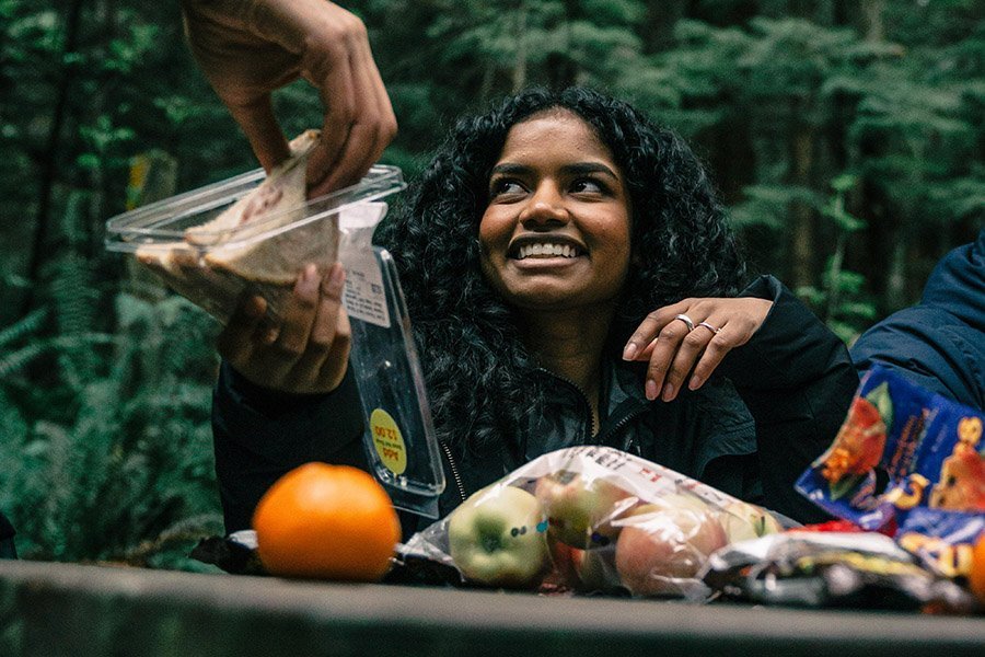 hikers sharing a snack