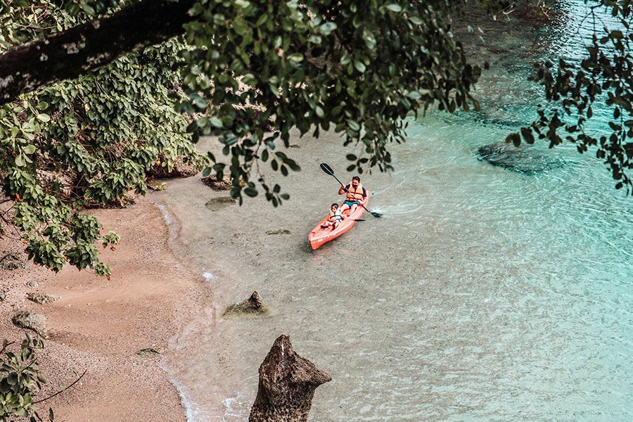 father and baby kayaking