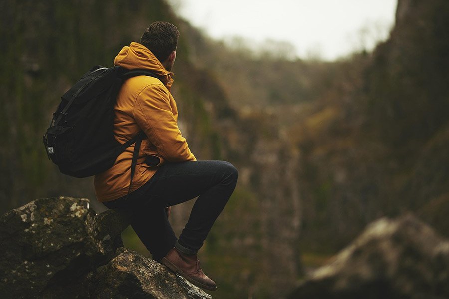 hiker with yellow jacket