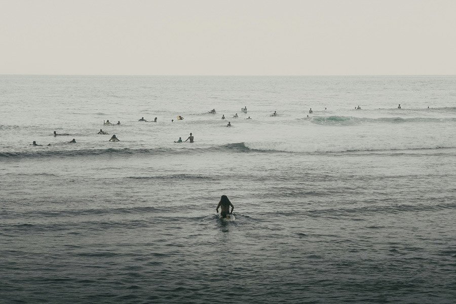 Surfer lineup in Siargao