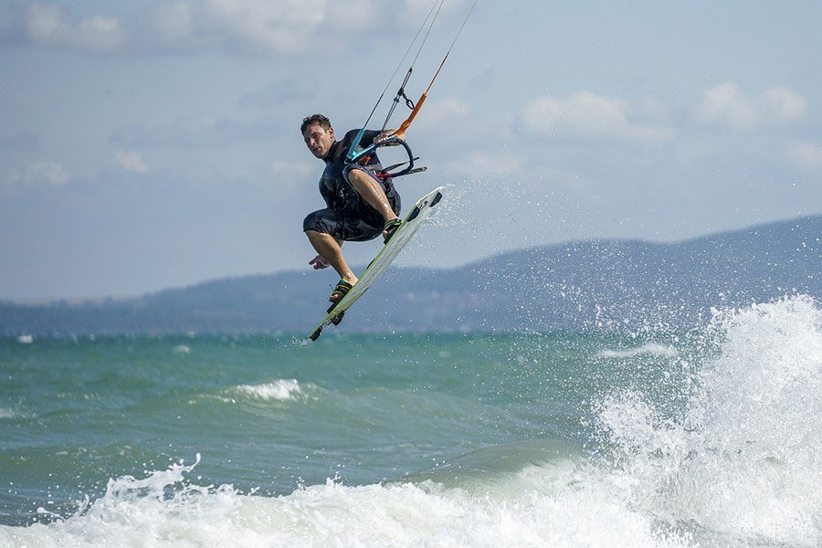 Kite surfer jumping