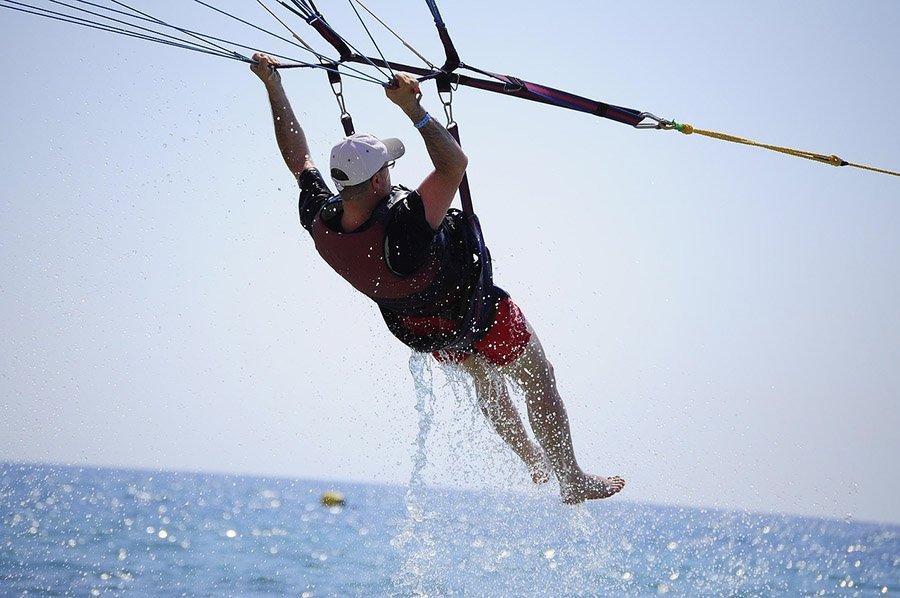 Parasailer touching the water
